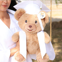 Thumbnail for graduation bear with white cap and gown