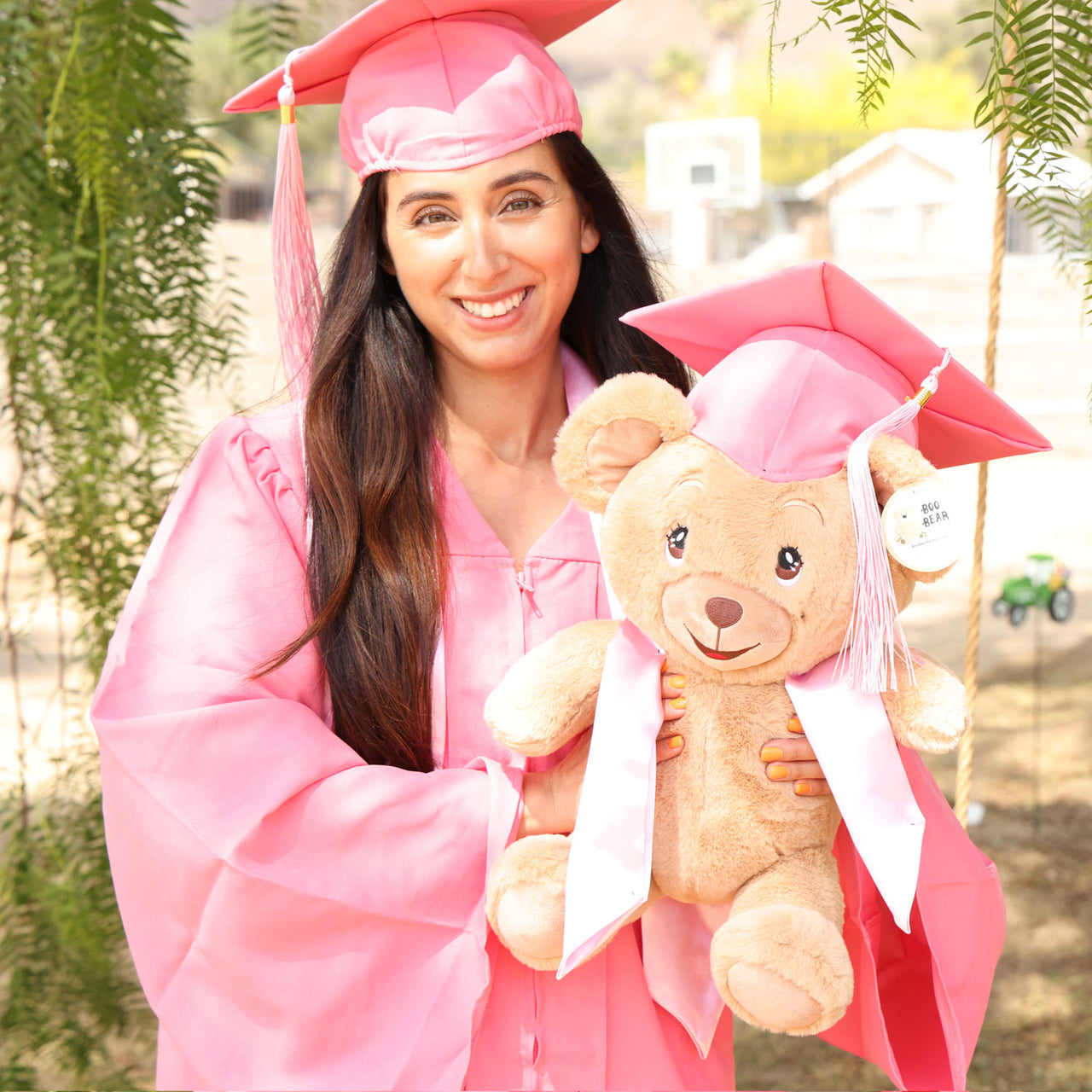 graduation teddy bear with pink cap and gown