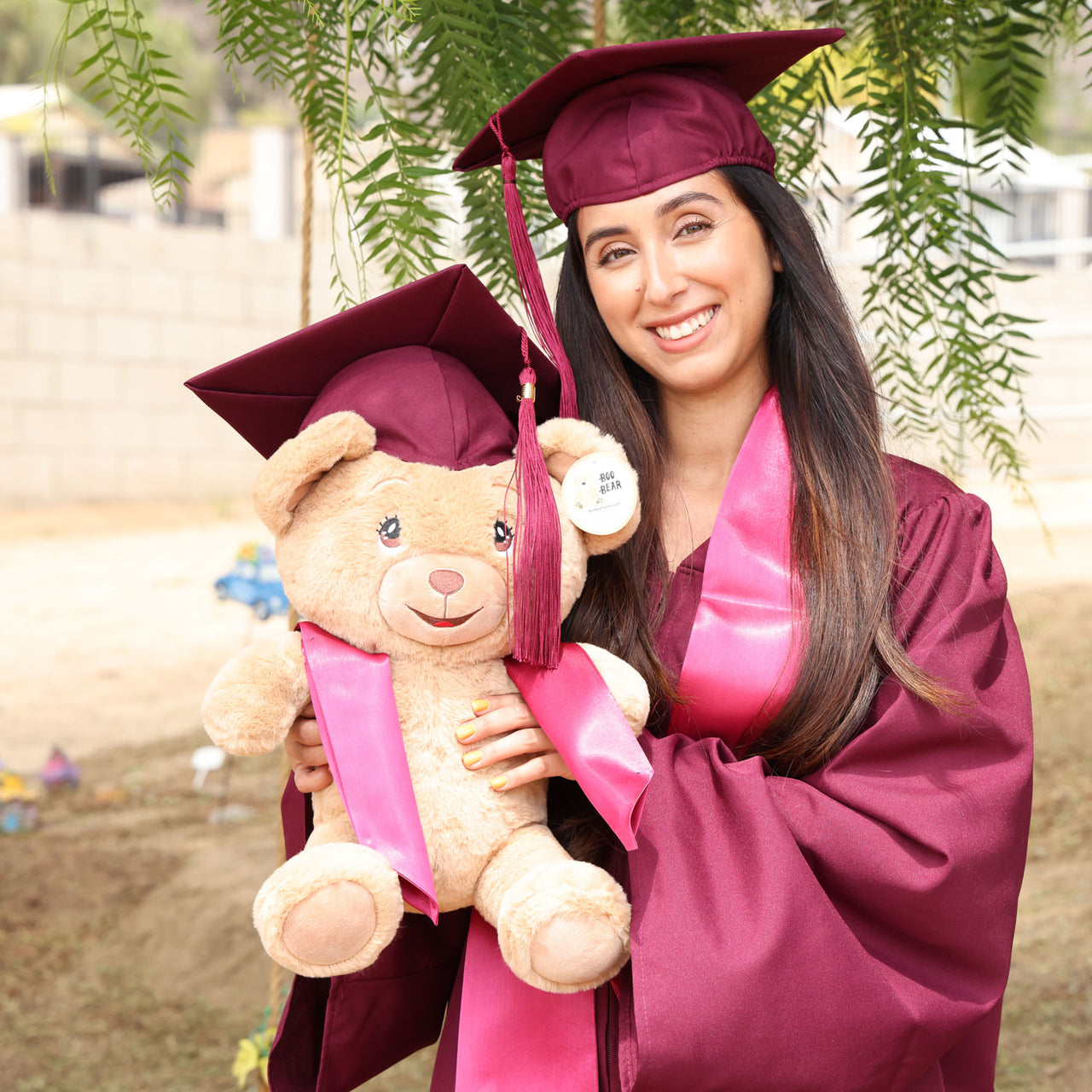 teddy bear for graduation with maroon burgundy cap and gown